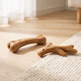 Load image into Gallery viewer, Titan chew in bone and antler shapes on a pale oak floor