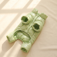Load image into Gallery viewer, Verbier Puffer Suit in green laid flat on a cream background
