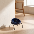 Load image into Gallery viewer, Onda Raised Bowl on an oak floor in late afternoon light