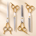 Load image into Gallery viewer, Aurea Grooming Shears, four gold-handled shears laid out in a row