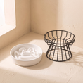 Ladda bilden i Galleri Viewer, The Lumière ceramic bowl lifted out of its black wire stand, shown side by side