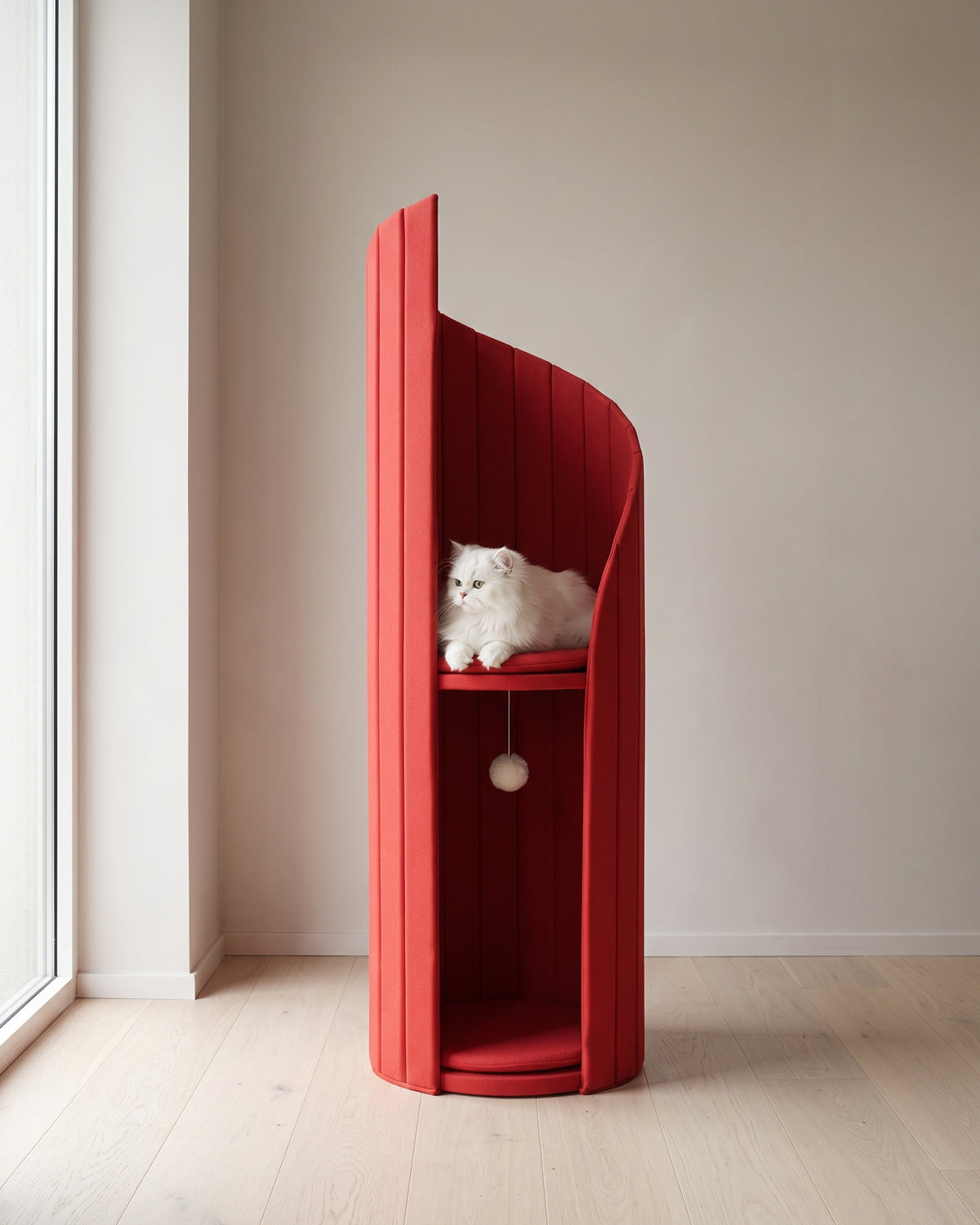 ARCHE in Coral Red beside a window in a neutral room, with a white cat resting on the upper perch