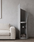 Load image into Gallery viewer, ARCHE in Gray beside a low linen sofa, showing its height against the furniture, with a cat curled in the lower alcove
