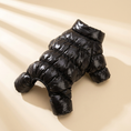 Load image into Gallery viewer, Verbier Puffer Suit in black laid flat on a cream background
