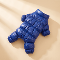 Load image into Gallery viewer, Verbier Puffer Suit in blue laid flat on a cream background

