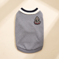Load image into Gallery viewer, Cortina Varsity Knit in gray laid flat on a cream background
