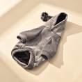 Load image into Gallery viewer, Gstaad Velour Hoodie in gray laid flat on a cream background
