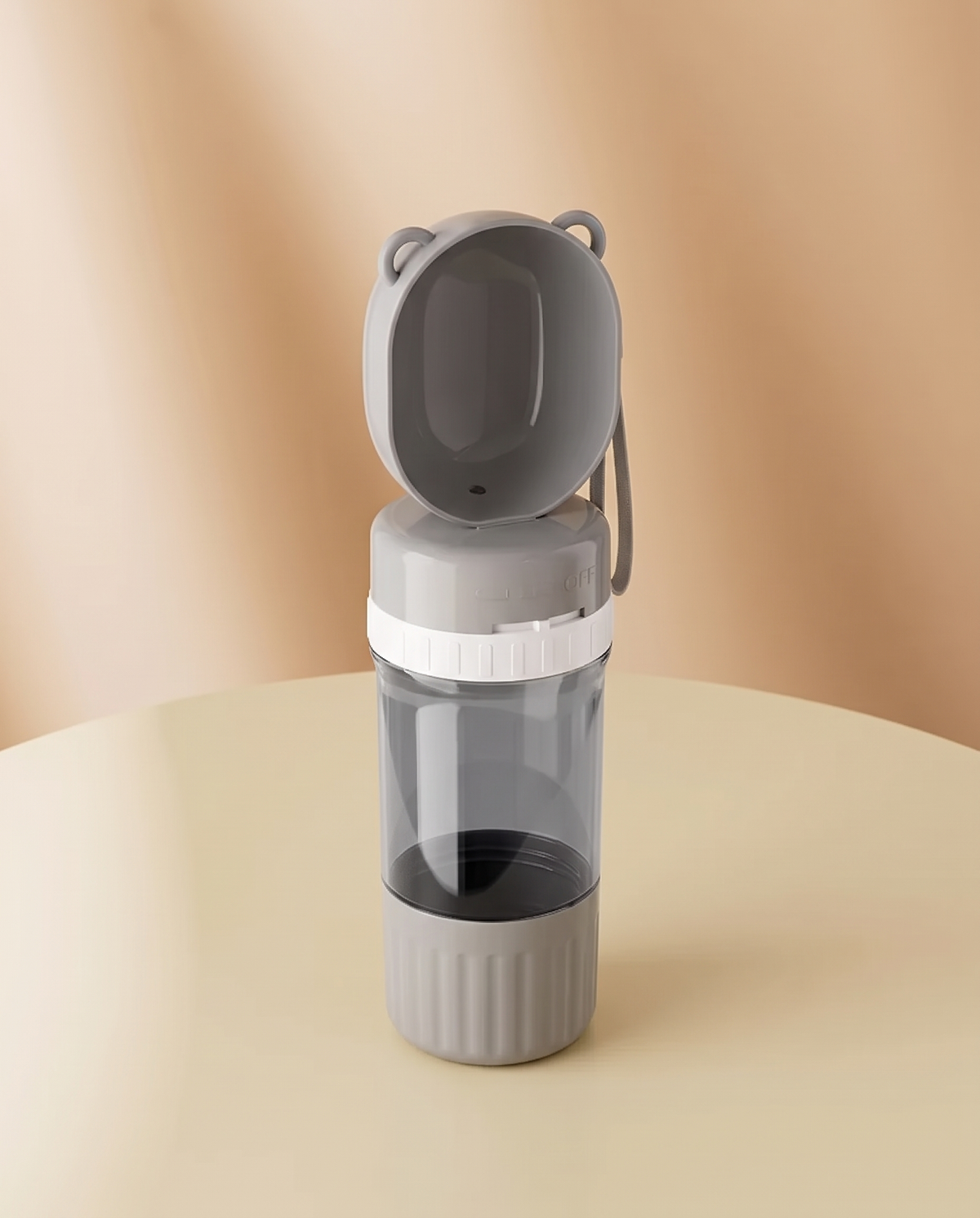 Arno Travel Bottle showing the open cup and the sealed lower food chamber