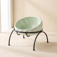 Load image into Gallery viewer, Onda Raised Bowl in Light Green on a cream ground
