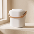 Load image into Gallery viewer, Dispensa Food Canister, closed, with its tan carry strap
