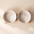 Load image into Gallery viewer, Carrara Pet Bowl Set seen from overhead, showing both bowl interiors

