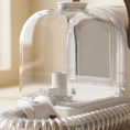 Load image into Gallery viewer, Close view of the Aspira clear collection chamber and hose connection
