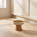 Load image into Gallery viewer, Cima Elevated Bowl on a pale oak kitchen floor beside cream cabinetry in morning light
