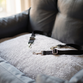 Load image into Gallery viewer, Close view of the Strada tether clips on the removable inner mat

