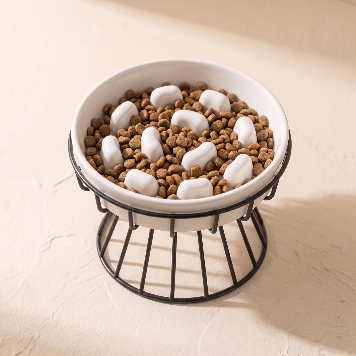 Lumière Slow Feeder Bowl filled with kibble, the raised pattern standing clear of the food