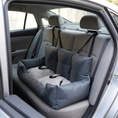 Load image into Gallery viewer, Strada Car Seat installed on a car's rear bench, straps looped over the headrests
