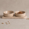 Travertine pet bowl set: two natural travertine bowls seated in a single stone base plate